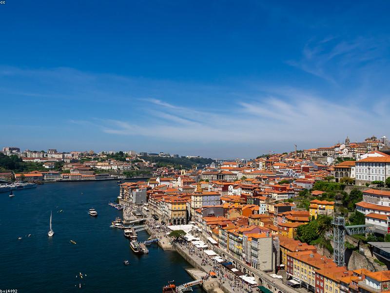 A scenic travel destination with mountains and a clear blue sky