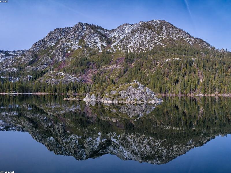 Couple kayaking in Emerald Bay at Lake Tahoe with blue water