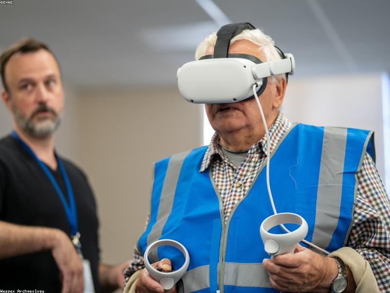 Person wearing VR headset in modern room